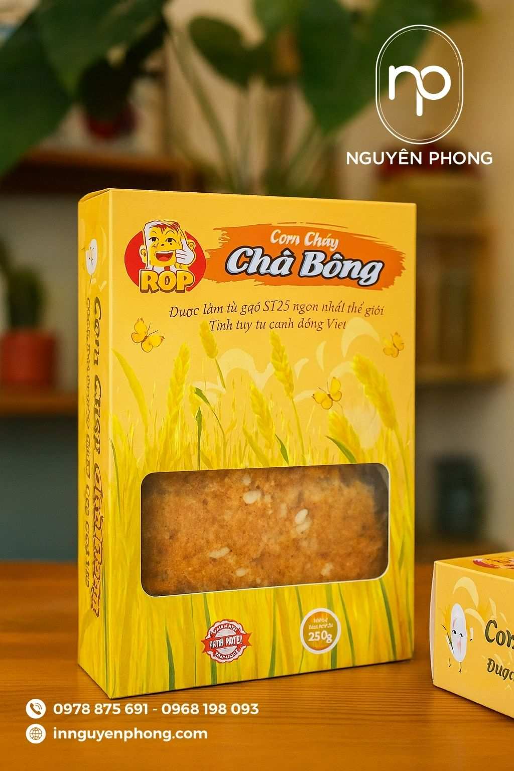 Mẫu hộp giấy đựng cơm cháy cán màng mica